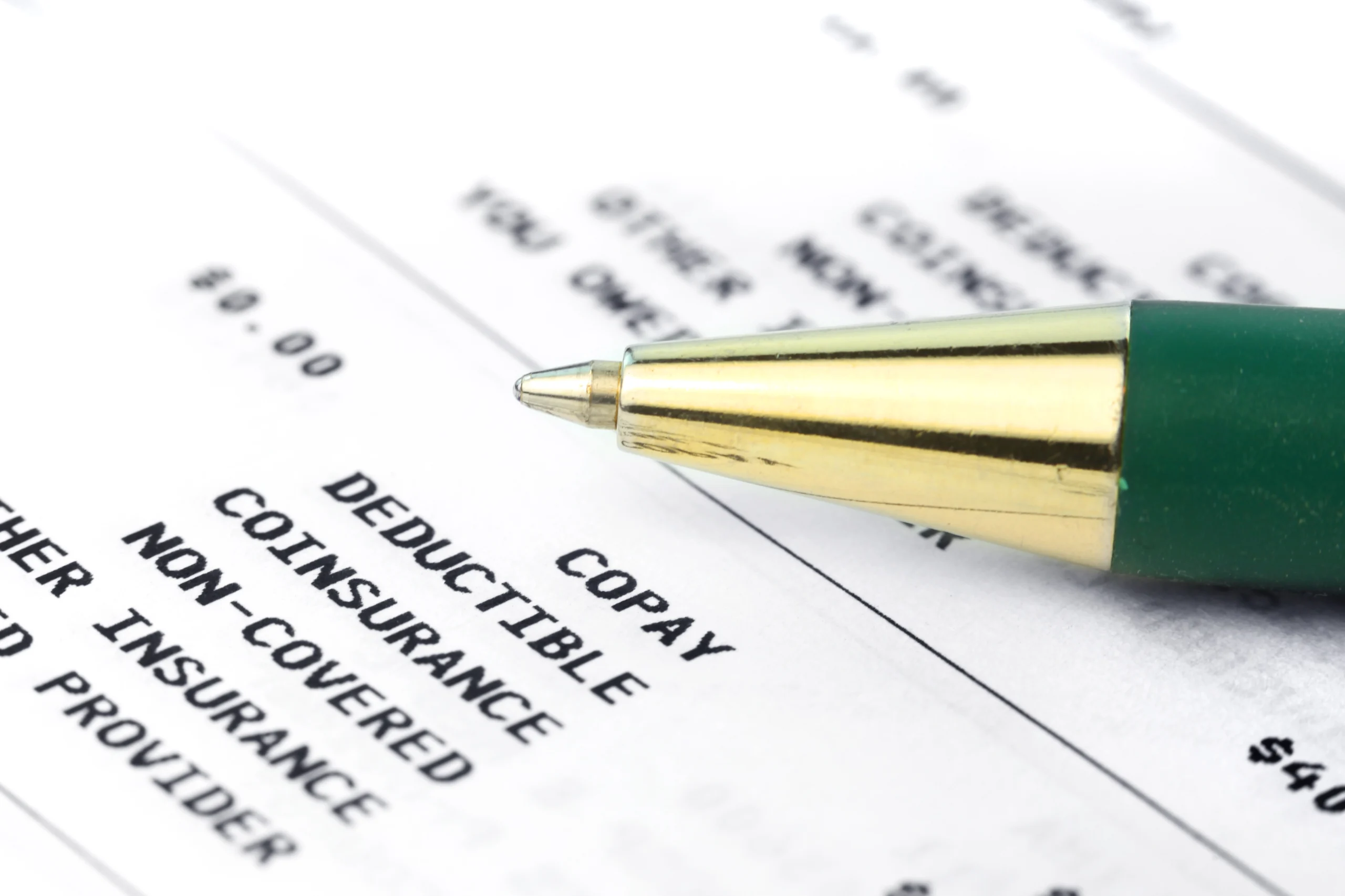 close up of a pen pointing at a RJHP medical insurance form